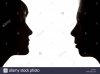 berlin-germany-the-silhouette-of-two-people-standing-opposite-D170PG.jpg