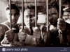 fv3044-malek-chamoun-bw-3-men-behind-bars-B8D24A.jpg